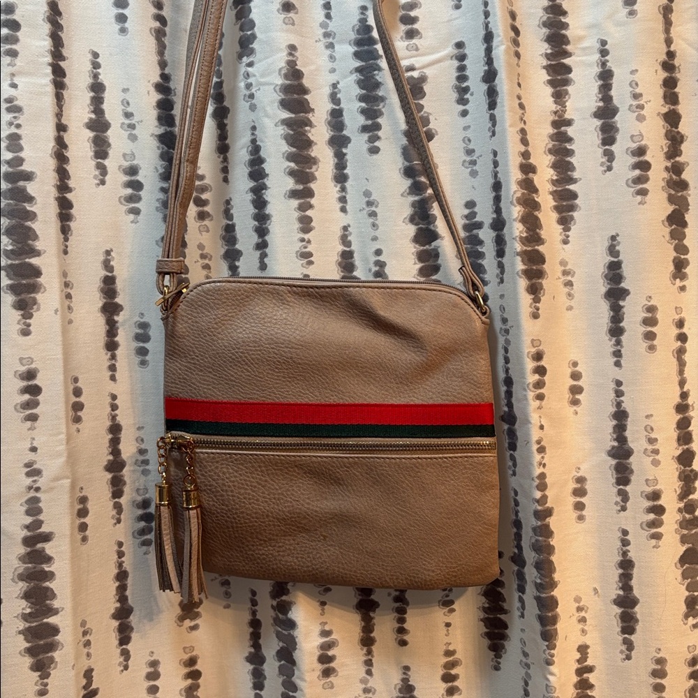 Tan crossbody adjustable strap green and red stripe